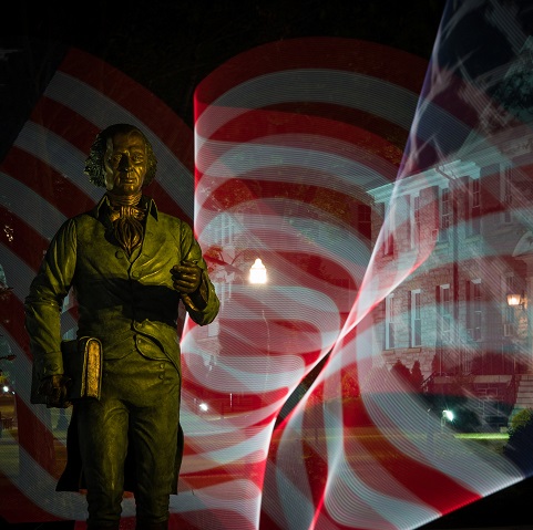 photo of Jimmy statue with American flag