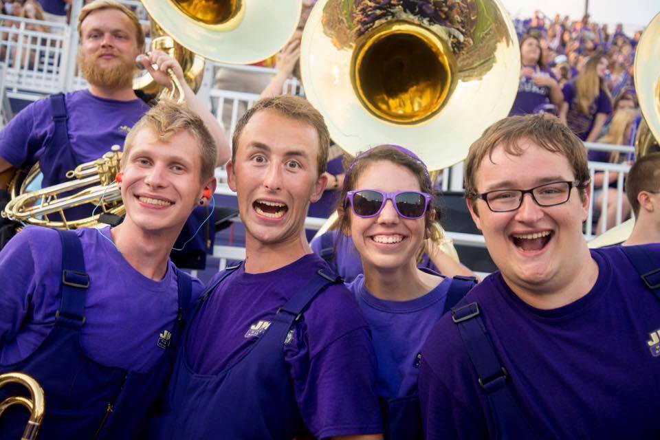 Stuart representing the Marching Royal Dukes with his friends at a football game