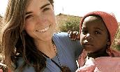 Christine Bolander holding Ugandan child