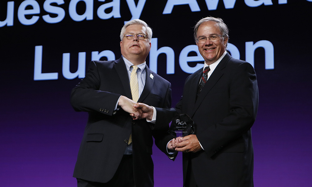 Dr. Paul Copley receiving the AGA Award - 2016