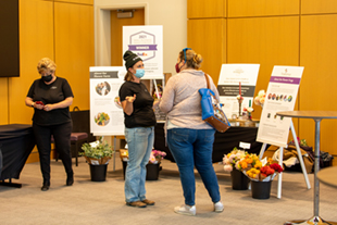 Exhibitors and business-owners mingled at the “Women in Entrepreneurship Showcase.”