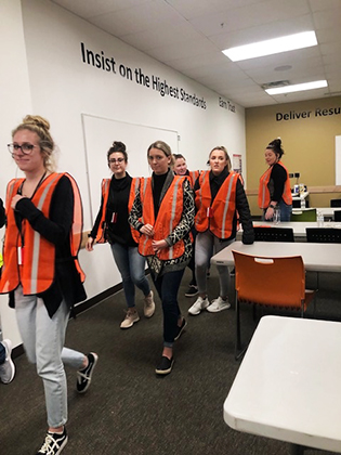 Global Supply Chain Management students during a trip to an Amazon Fulfillment Center - 2019