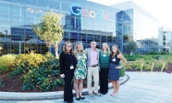 Dr. Theresa Clarke and four JMU students in front of Google headquarters in 2015