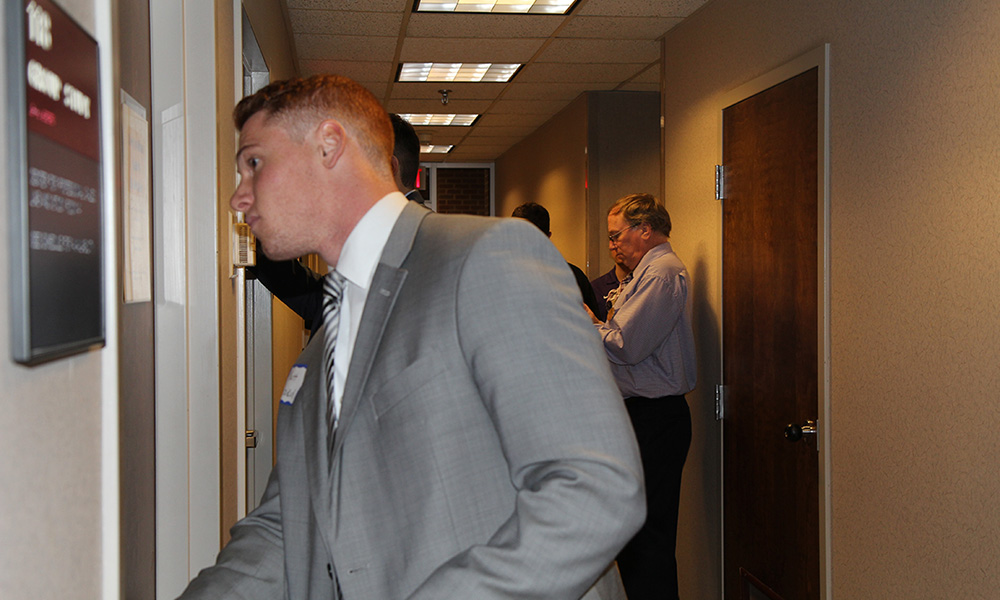 JMU Marketing Student entering room during Internal Sales Competition