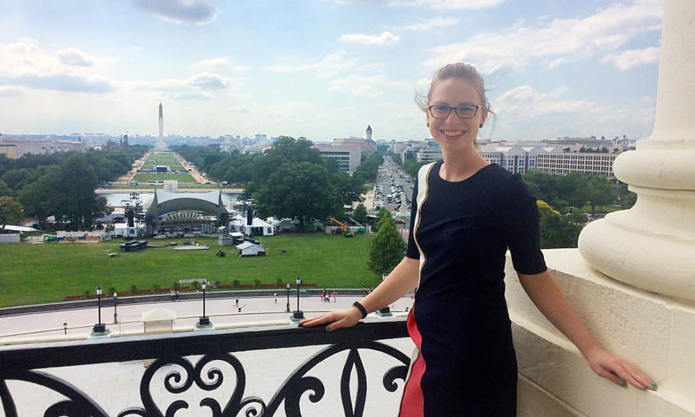 Kiersten Schierenbeck standing on a balcony