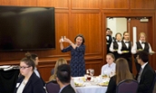 Etiquette pro demonstrating a point at the 2017 Etiquette Dinner
