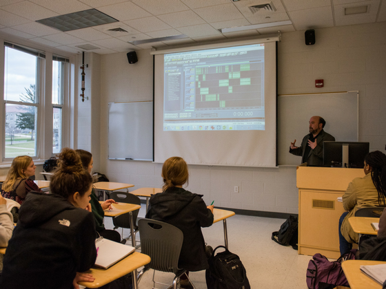 Image of Sean Tubbs presenting on audio editing program Adobe Audition to Sarah O'Connor's WRTC students
