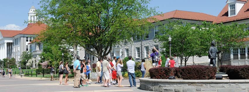 Tour of campus near life-size Madison statue