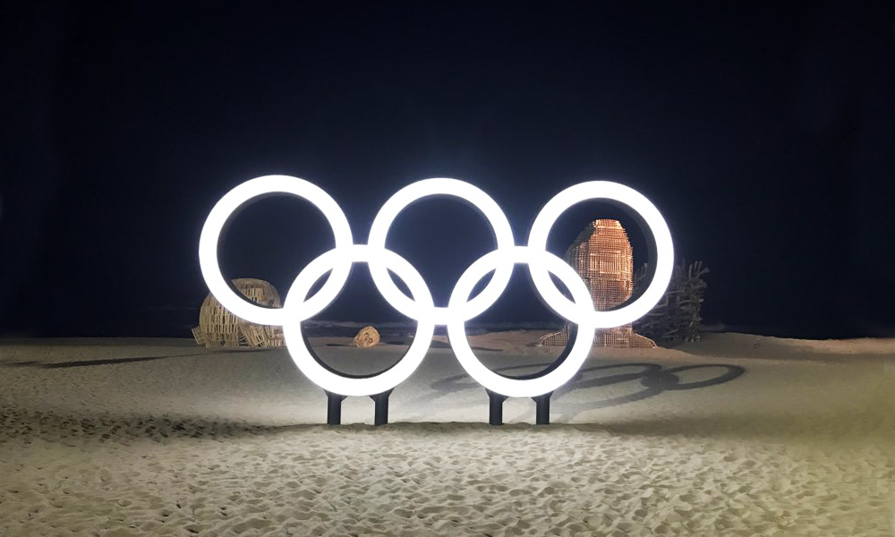 Olympic sign in snow at night - 2018 Winter Olympic Games - PyeongChang