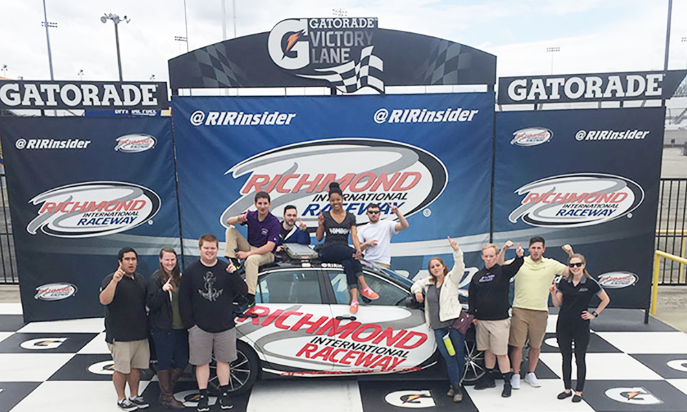 SRM Students posing in the Richmond International Raceway Victory Lane - 2017