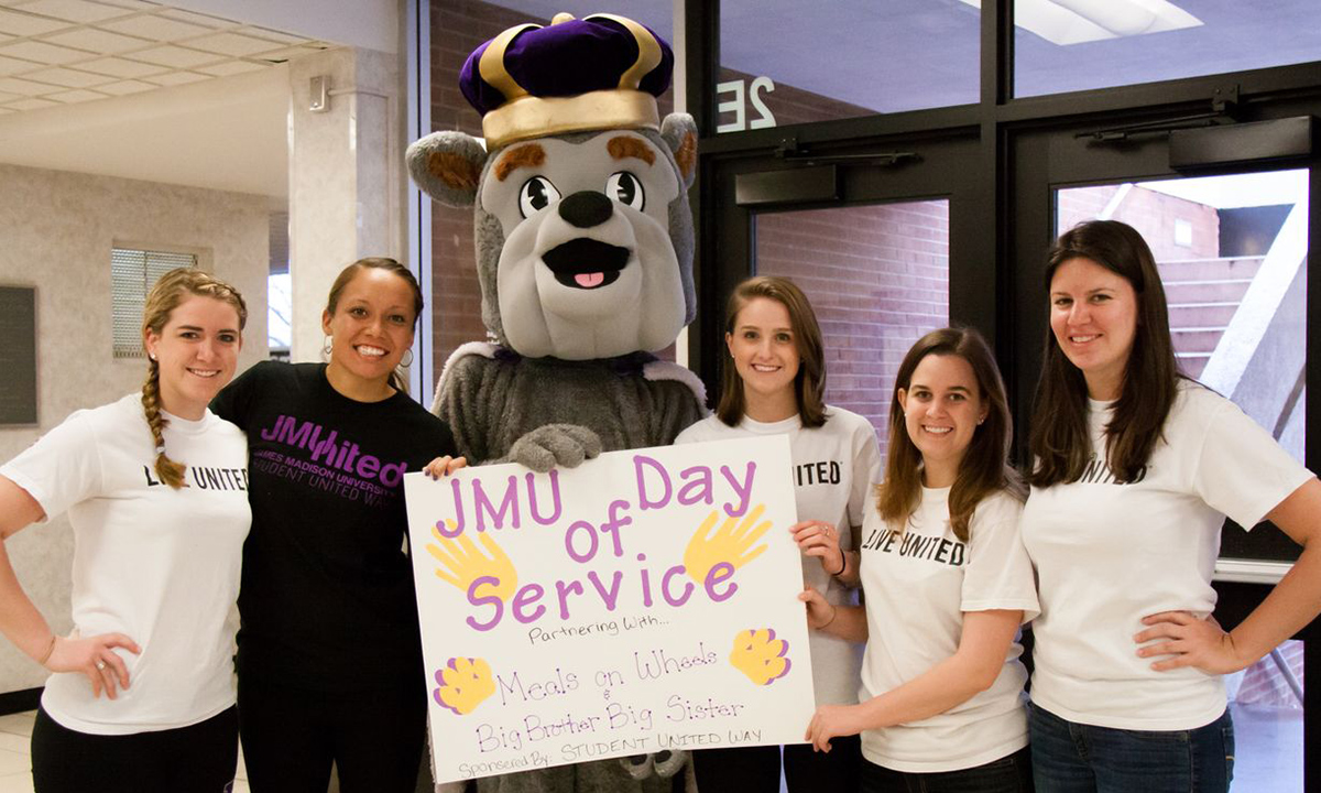 Members of the Student United Way club join the Duke Dog in the JMU Day of Service. 