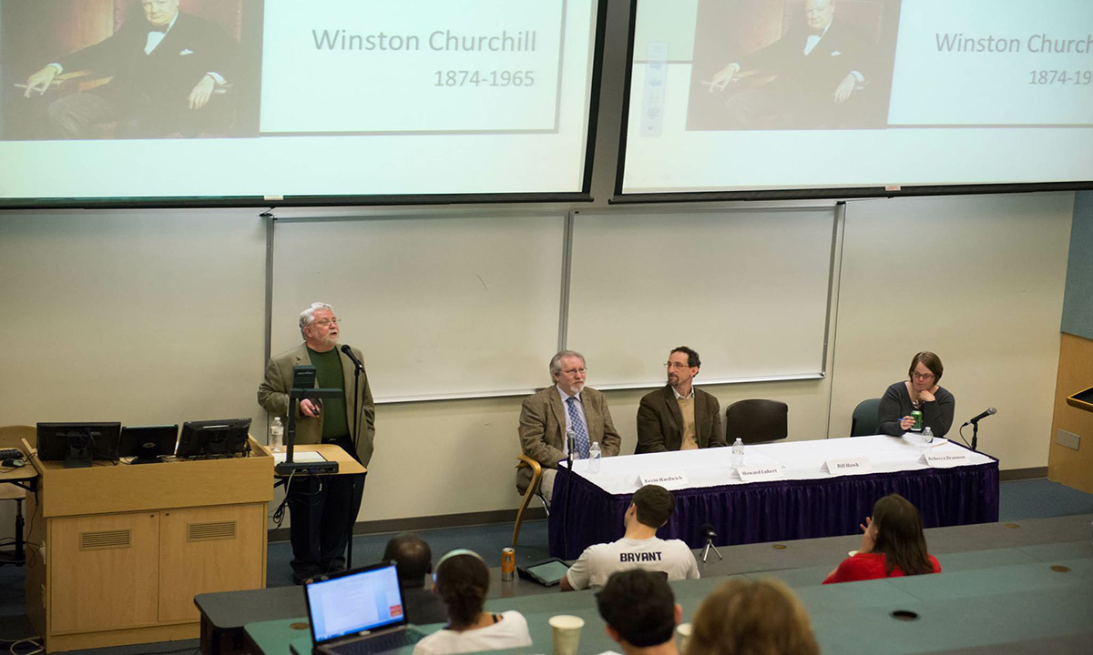 William Hawk (philosophy and religion) tells the audience how the political ideals of James Madison shaped the nation. Other participants (L-R): Kevin Hardwick (history), Howard Lubert (political science) and moderator Rebecca Brannon (history).