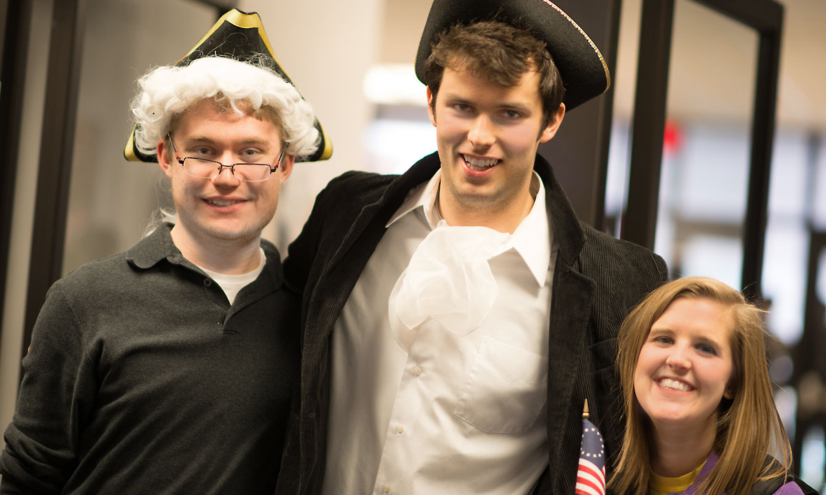 Student employees donned colonial garb to welcome students, faculty and staff to Tea Time. 