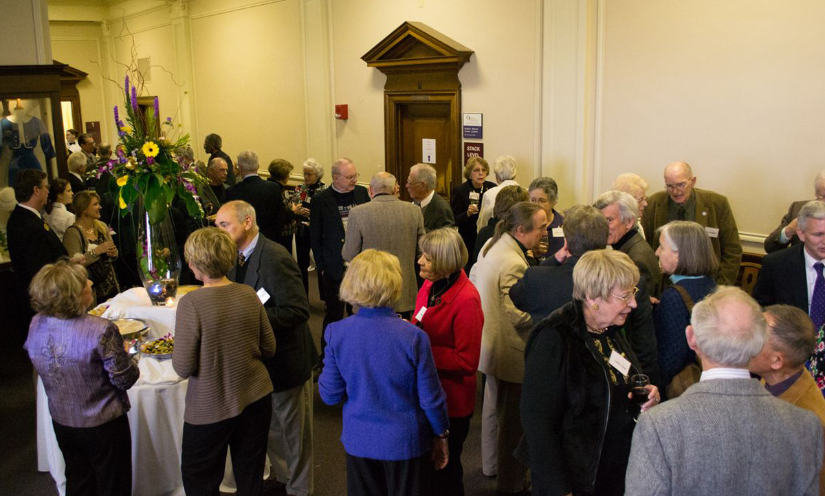 Faculty emeriti enjoy a reception in their honor at Carrier Library. The JMU Faculty Emeriti Association sponsors events throughout the year like a trip to the Dale Chihuly exhibit at the Virginia Museum of Fine Arts in January.
