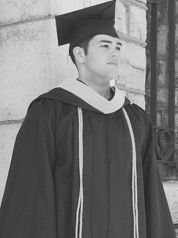 photograph of Ryan Harris in his cap and gown