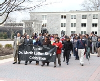 Students, faculty and staff participate in the MLK march