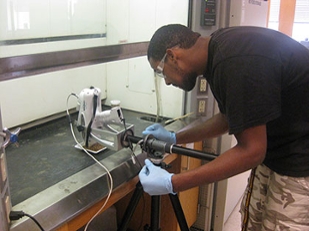 a JMU student uses the handheld spectrometer