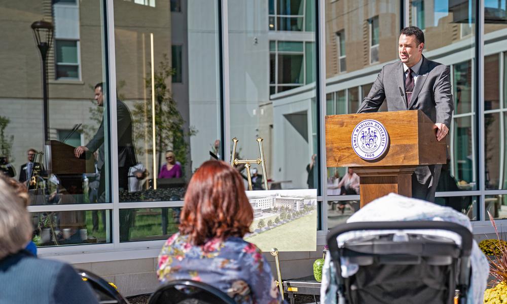 Raleigh Marshall speaking at the opening of Paul Jenning Hall