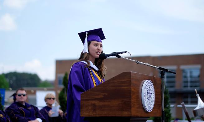 Photo of Rosemary Girard speaking at 2015 undergraduate commencement