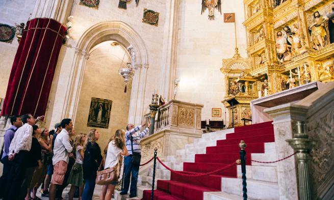 Students learn about the history and architecture of Granada Cathedral in Spain