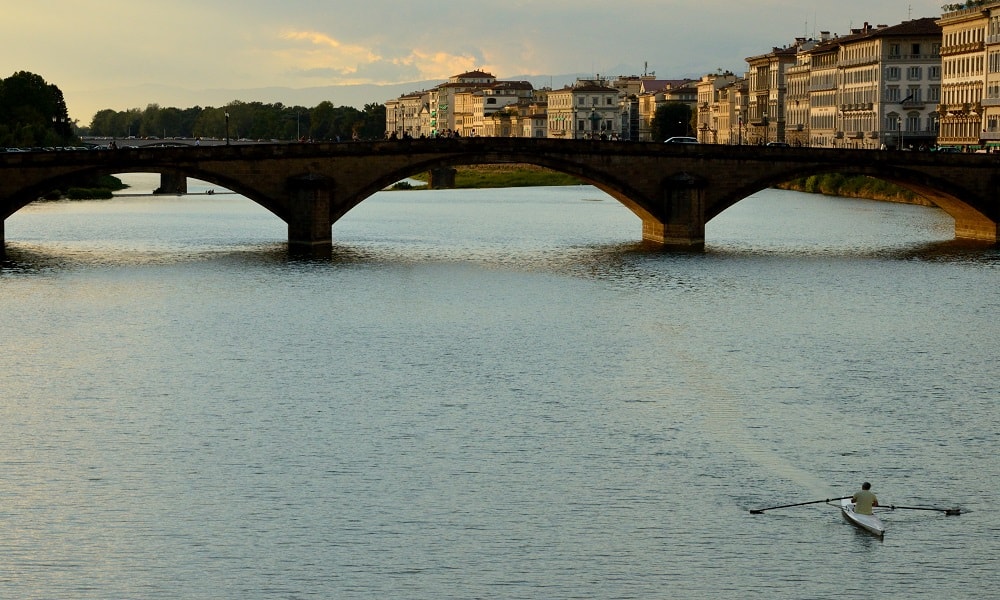 Rower over the Arno in Florence