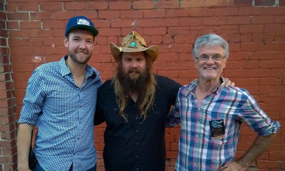 Zach Peters, left, (JMU '09), Manager, Red Light Management, Charlottesville, with client Chris Stapleton.