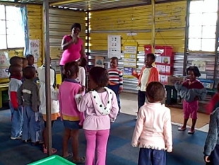 Teacher leading a preschool class
