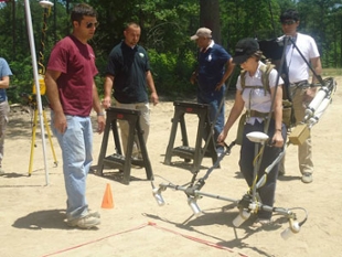 Course participants see equipment demonstration.
