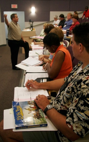 Instructor gives a lesson to teachers