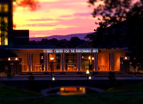 photo of Forbes Center in the evening