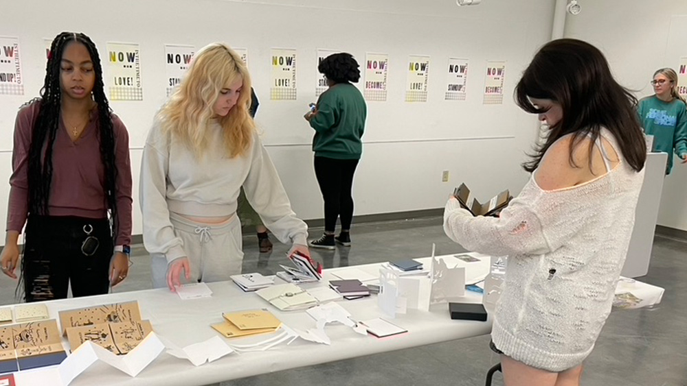 Students with book arts projects