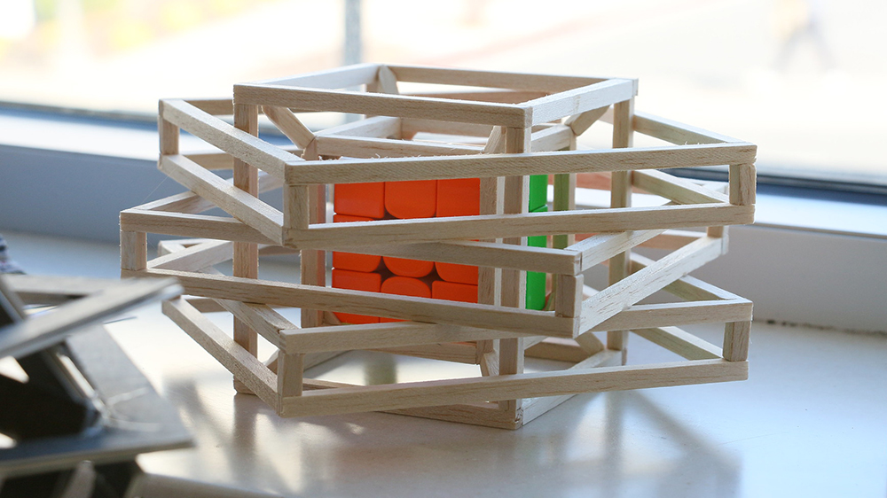 rubiks cube inside wooden frame