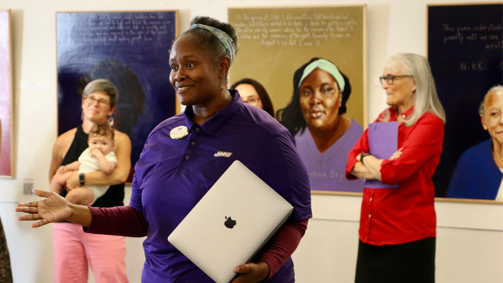 Woman speaking about exhibition