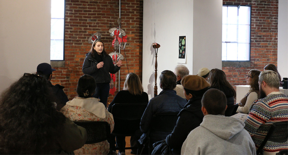 student speaking about art