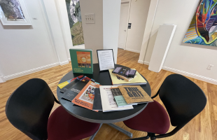 The exhibition's reading table featured texts from the graduate program's faculty.