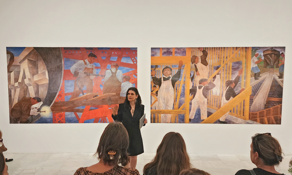 Dr. Laura Katzman leads a tour through an exhibition she curated