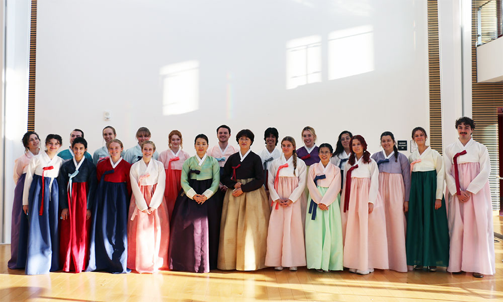 Participating students from the masterclass pose with Profs. Suntae Hwang and JungOk Um in Duke Hall.