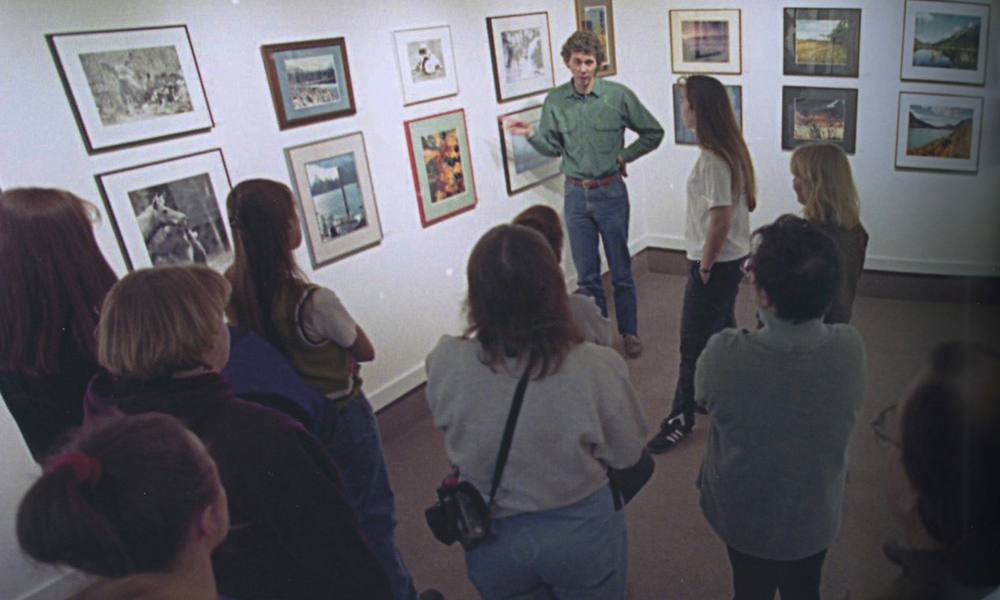 Gary Freeburg with students in the gallery