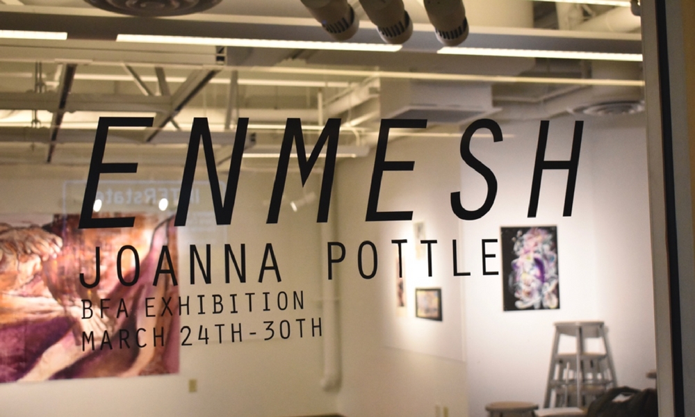 Enmesh Sign on Glass