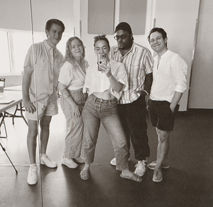 casting team in front of mirror