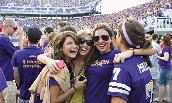 Alex LaMar ('12) celebrates a home football game with classmates