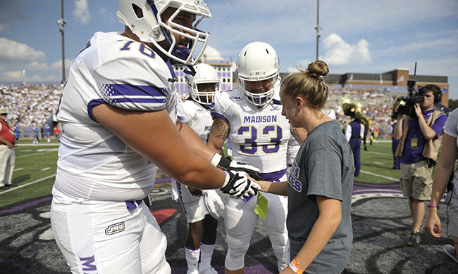 Football players and olympian