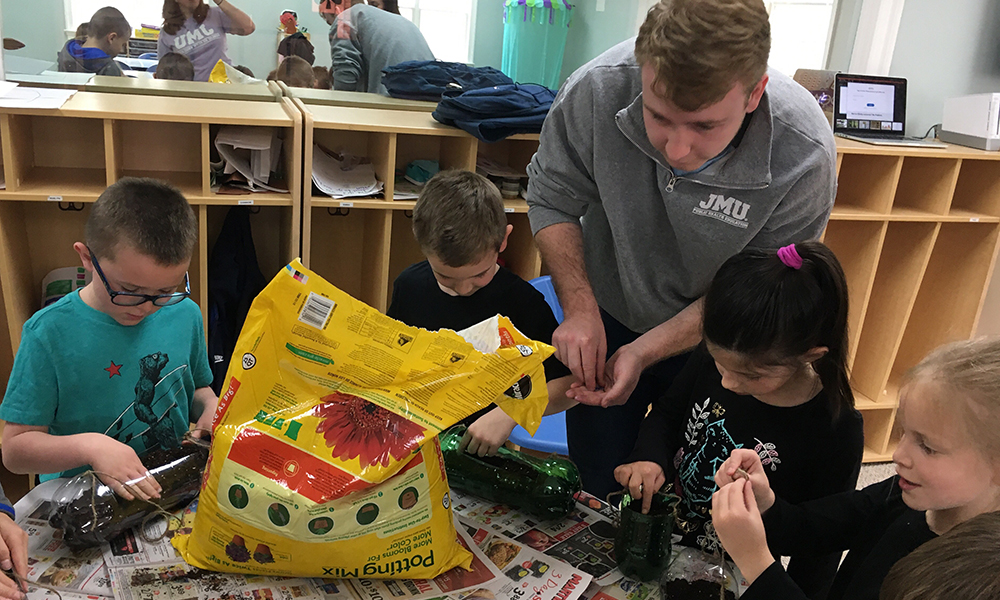 PHOTO: HS student works with children