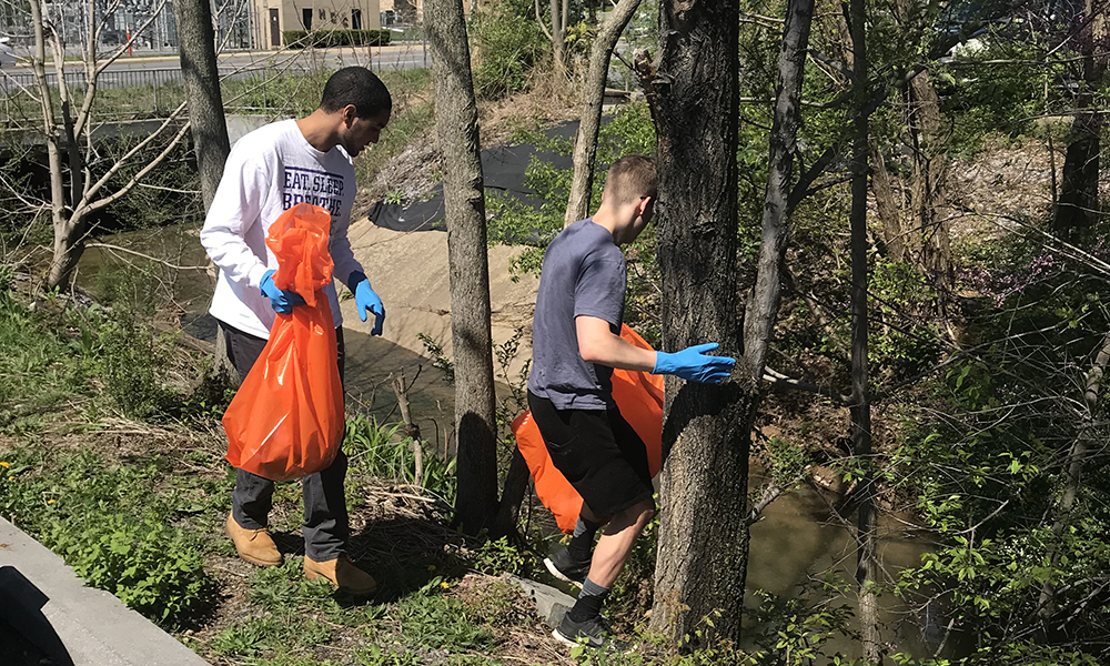PHOTO: HS students clean up stream