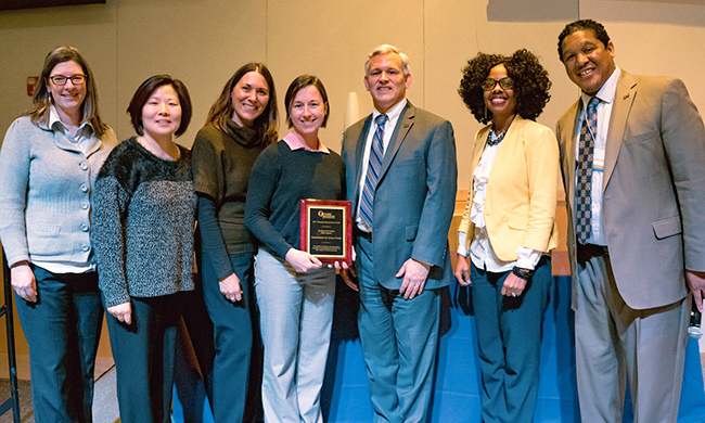 PHOTO: SW Faculty with award