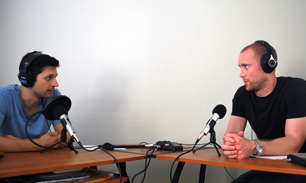 PHOTO: Ryan Van Patten recording podcast