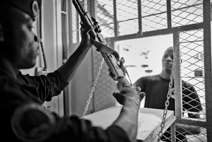 Issuing a registered arm in Burkina Faso, 2015. Image courtesy of Sean Sutton/MAG.