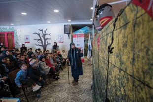 Everyone has the right to access life-saving information. A MAG CL team delivers an EORE puppet show to children with disabilities in their school in Lebanon, February 2019. Image courtesy of Sean Sutton/MAG.