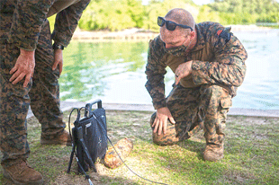 Figure 7. U.S. Marine Corps Littoral Explosive Ordnance Neutralization (LEON) assets remove WWII ordnance from littoral zones in the Republic of Palau as part of a Humanitarian Assistance Survey Team.21  Figure courtesy of United States Marine Corps. 22