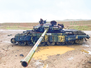 A damaged T-72 main battle tank. Although not heavily damaged, the clearance of the vehicle of AXO and Explosive Reactive Armour (ERA) is still a lengthy EOD task. AFV Clearance competencies are now rationalized into an EOD 3+ Module. Clearance of AFV is likely to be a significant part of future clearance efforts in Ukraine.  Image courtesy of Roly Evans.